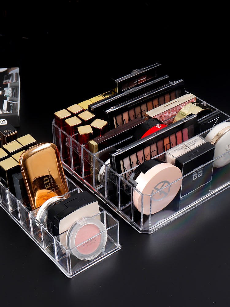 Cosmetic storage box with eye shadow tray and lipstick